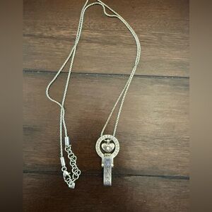 Elegant Silver and Gold Pendant Necklace